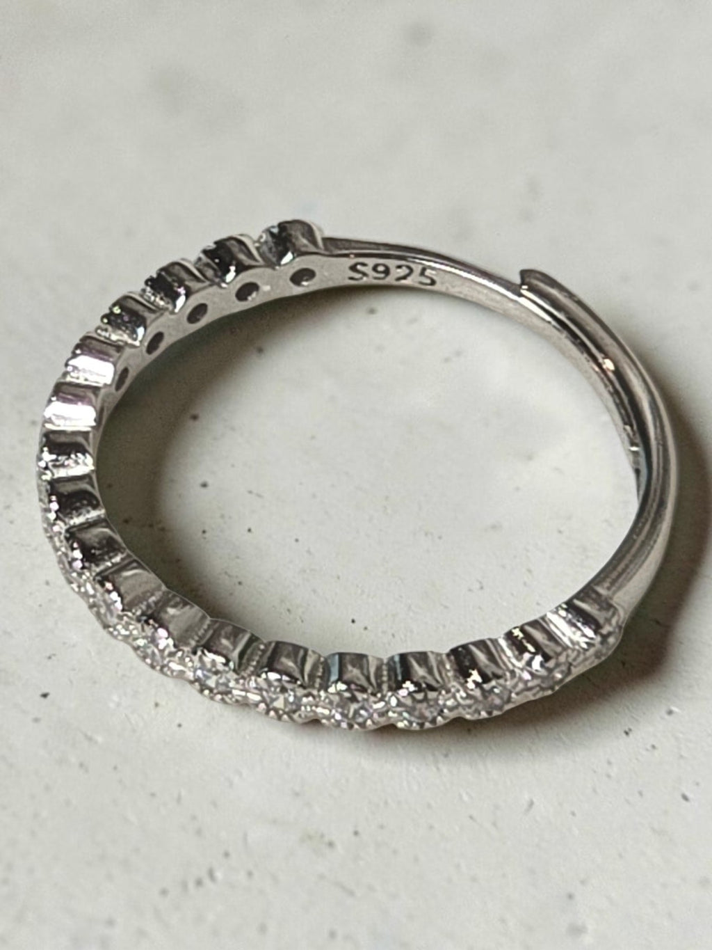 reveriebygemma adjustable half-eternity pavé ring in 925 sterling silver with cubic zirconia stones