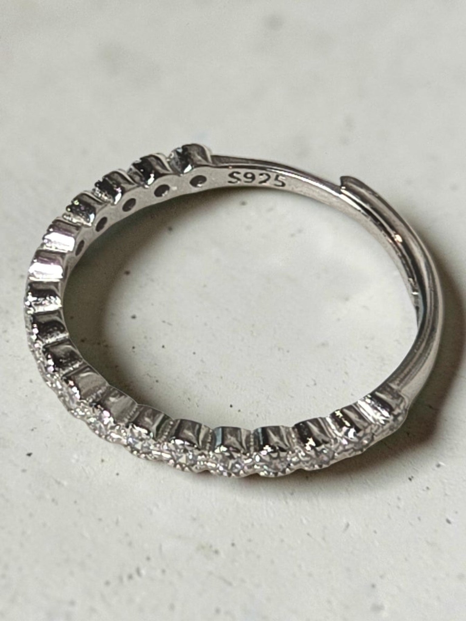reveriebygemma adjustable half-eternity pavé ring in 925 sterling silver with cubic zirconia stones