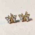reveriebygemma butterfly stud earrings in 18kt gold vermeil with simulated diamond and iridescent opal wings