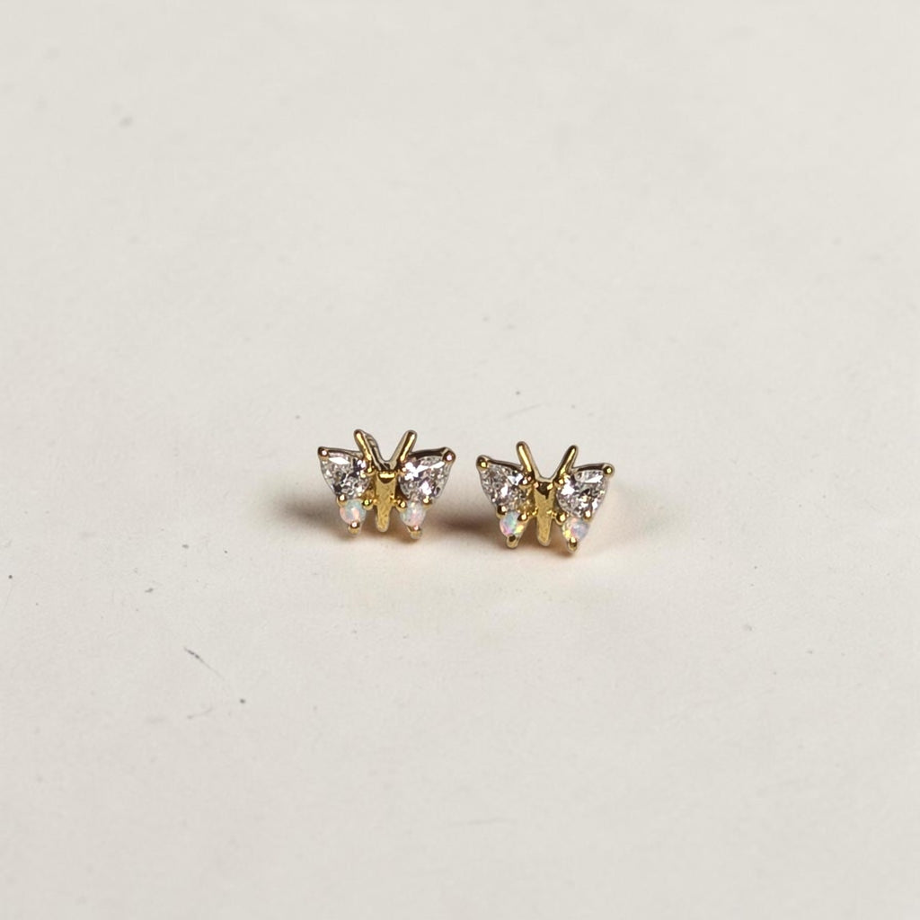 reveriebygemma butterfly stud earrings in 18kt gold vermeil with simulated diamonds and iridescent opals