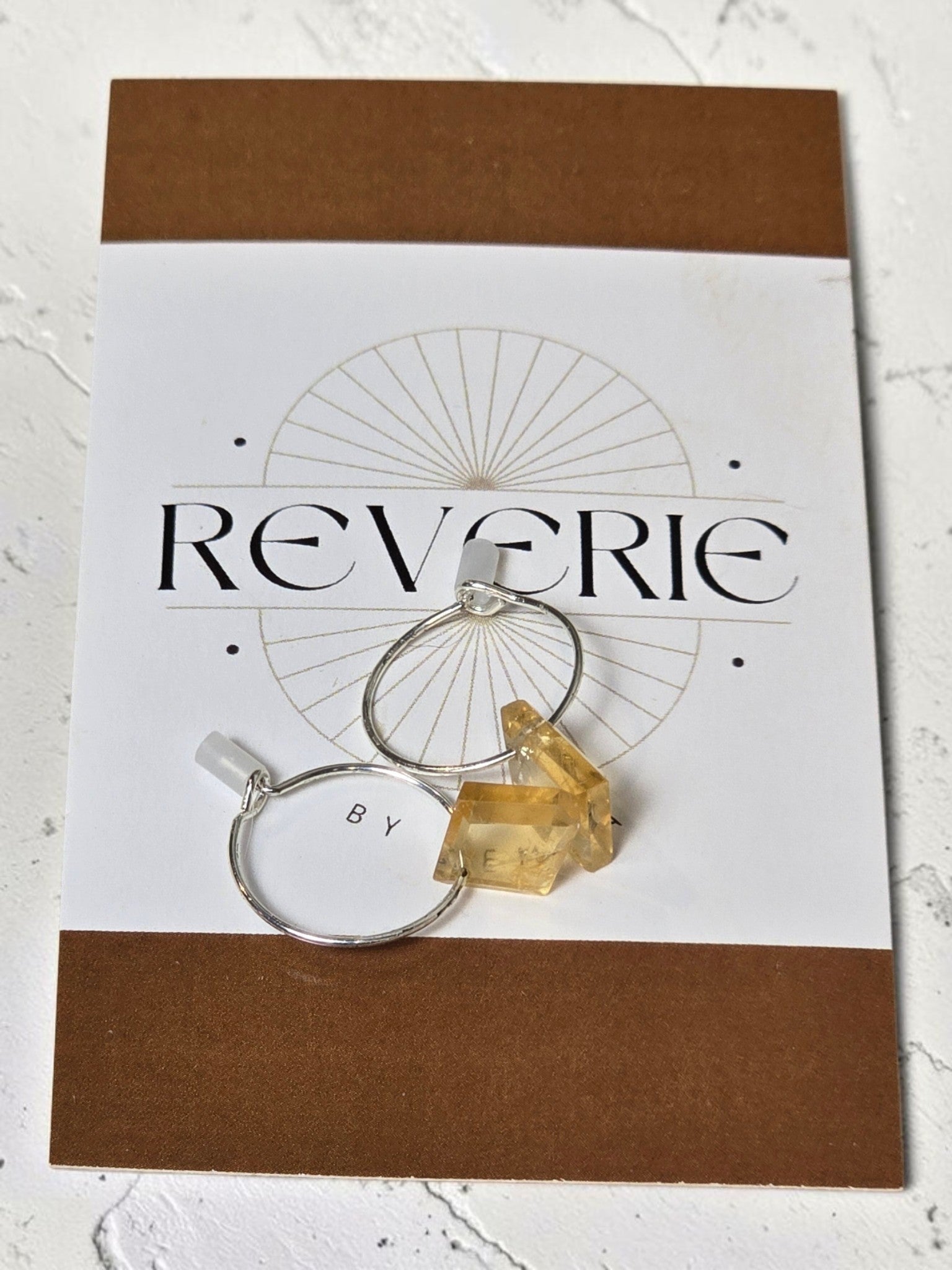 reveriebygemma citrine droplet mini hoop earrings in sterling silver with raw-cut geometric yellow gemstones