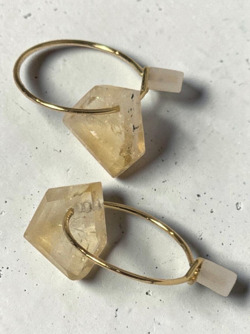 reveriebygemma gold-plated mini hoop earrings featuring raw-cut geometric citrine gemstone droplets