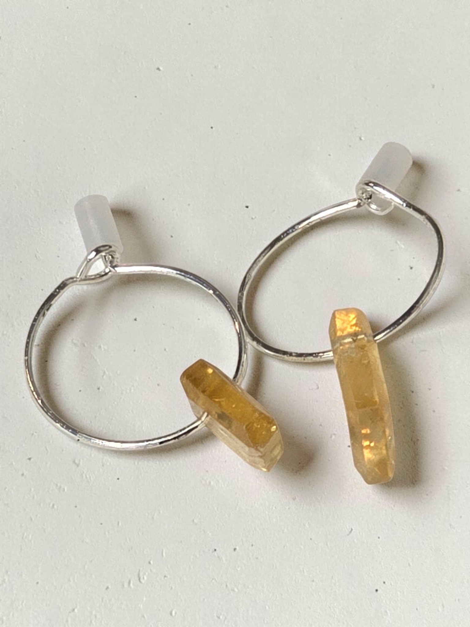 reveriebygemma sterling silver mini hoop earrings featuring raw-cut translucent citrine gemstone droplets