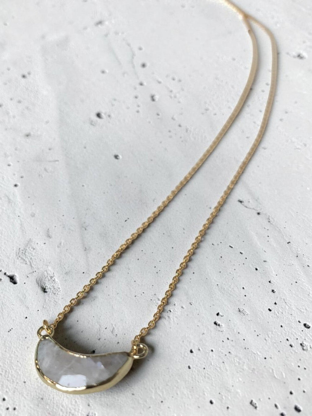 reveriebygemma crescent moonstone pendant necklace in 14kt gold plated sterling silver on a delicate chain