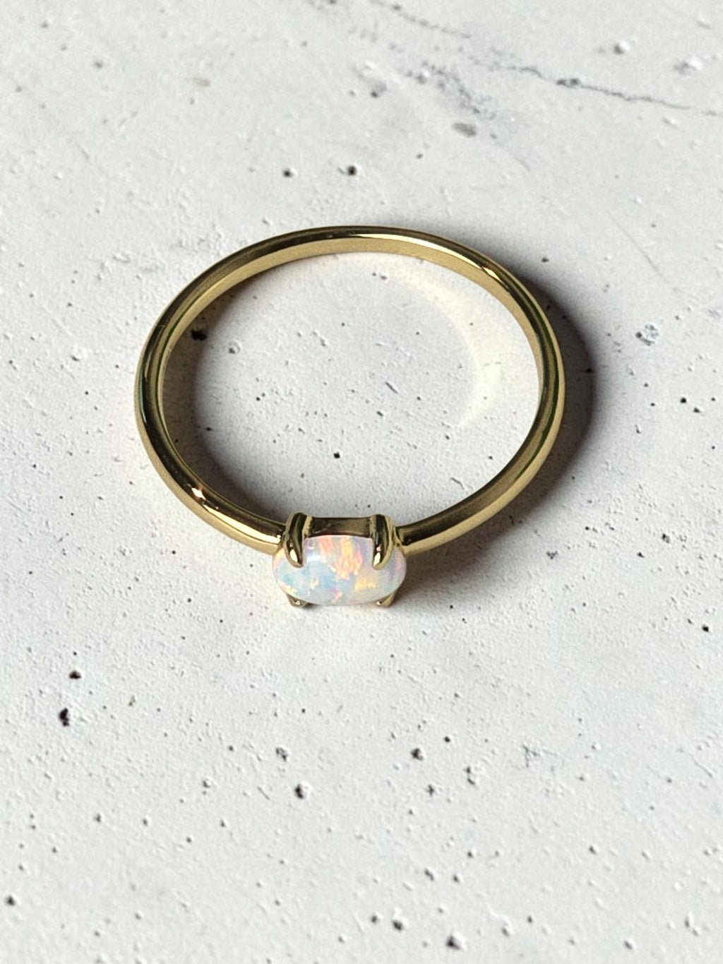 reveriebygemma fire opal stacking ring featuring a lab-created opal set in 14kt gold plated sterling silver