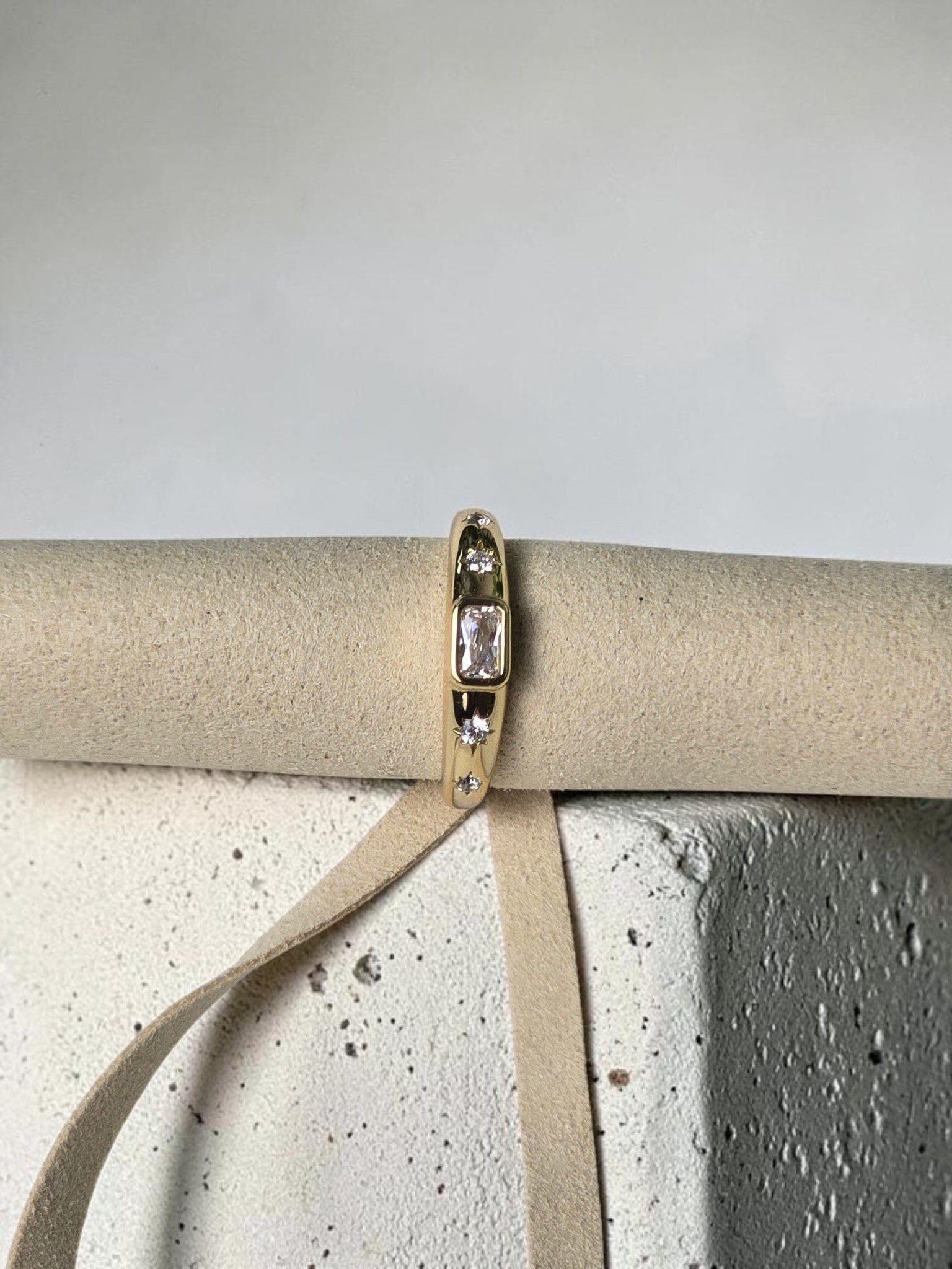 reveriebygemma 14kt gold plated sterling silver dome signet ring with baguette and round cubic zirconia starburst detail