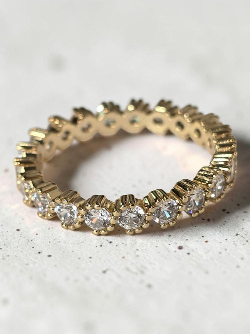 reveriebygemma 14kt gold plated sterling silver eternity band with bezel-set cubic zirconia and scalloped milgrain edges