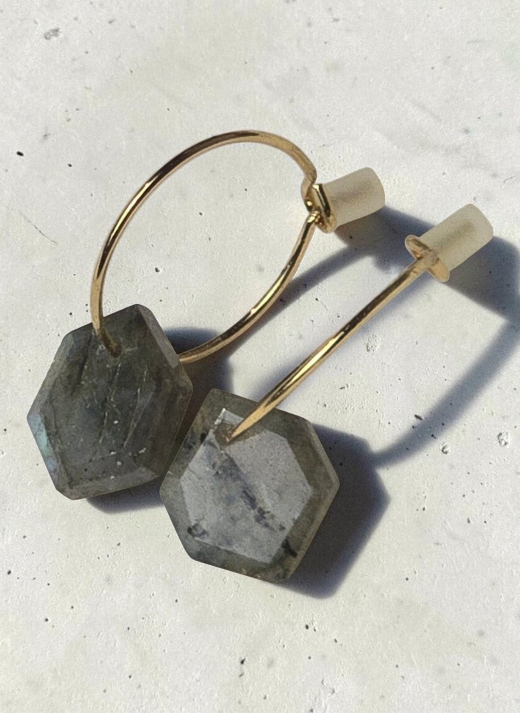 reveriebygemma gold plated huggie earrings with geometric labradorite stone drops featuring iridescent grey flashes