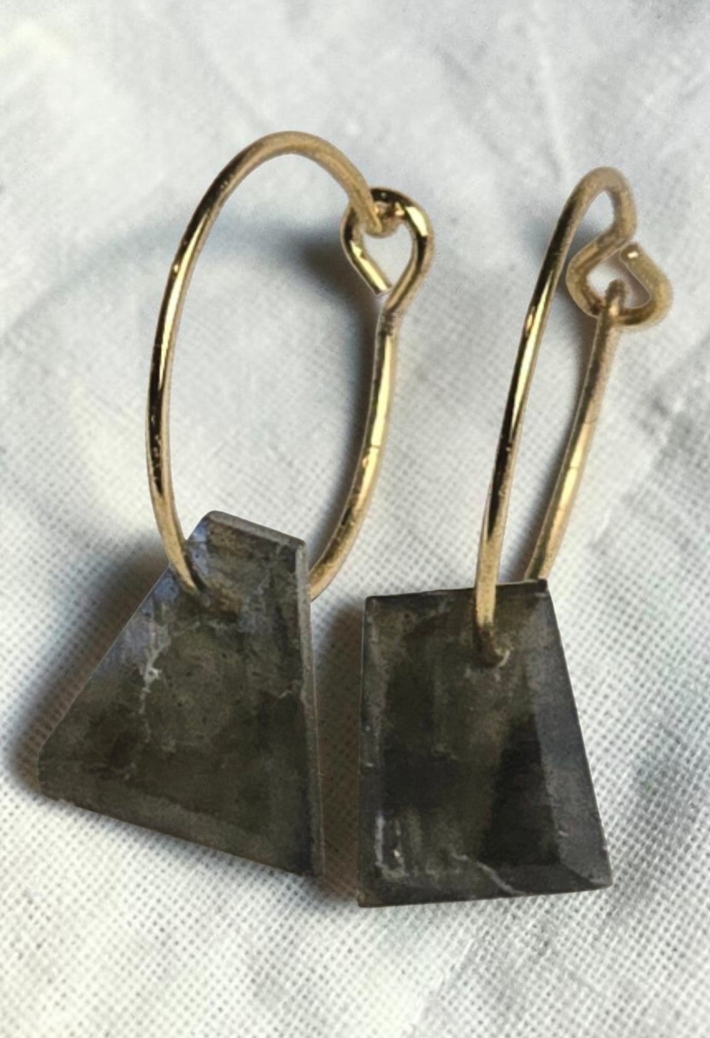reveriebygemma gold plated huggie earrings with geometric labradorite stone drops featuring iridescent grey tones