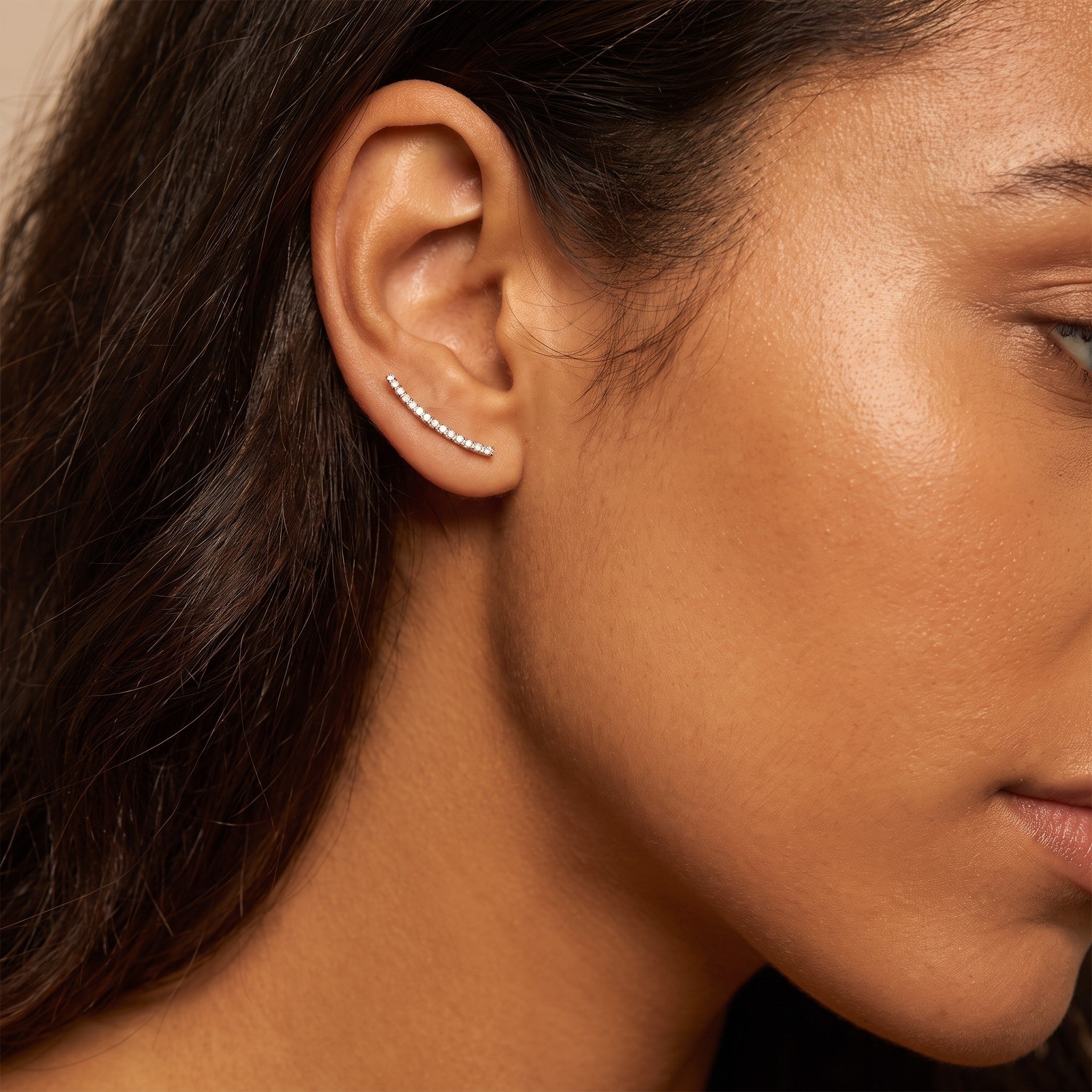 reveriebygemma 14kt gold plated sterling silver ear climbers with micro-pavé cubic zirconia worn on a model