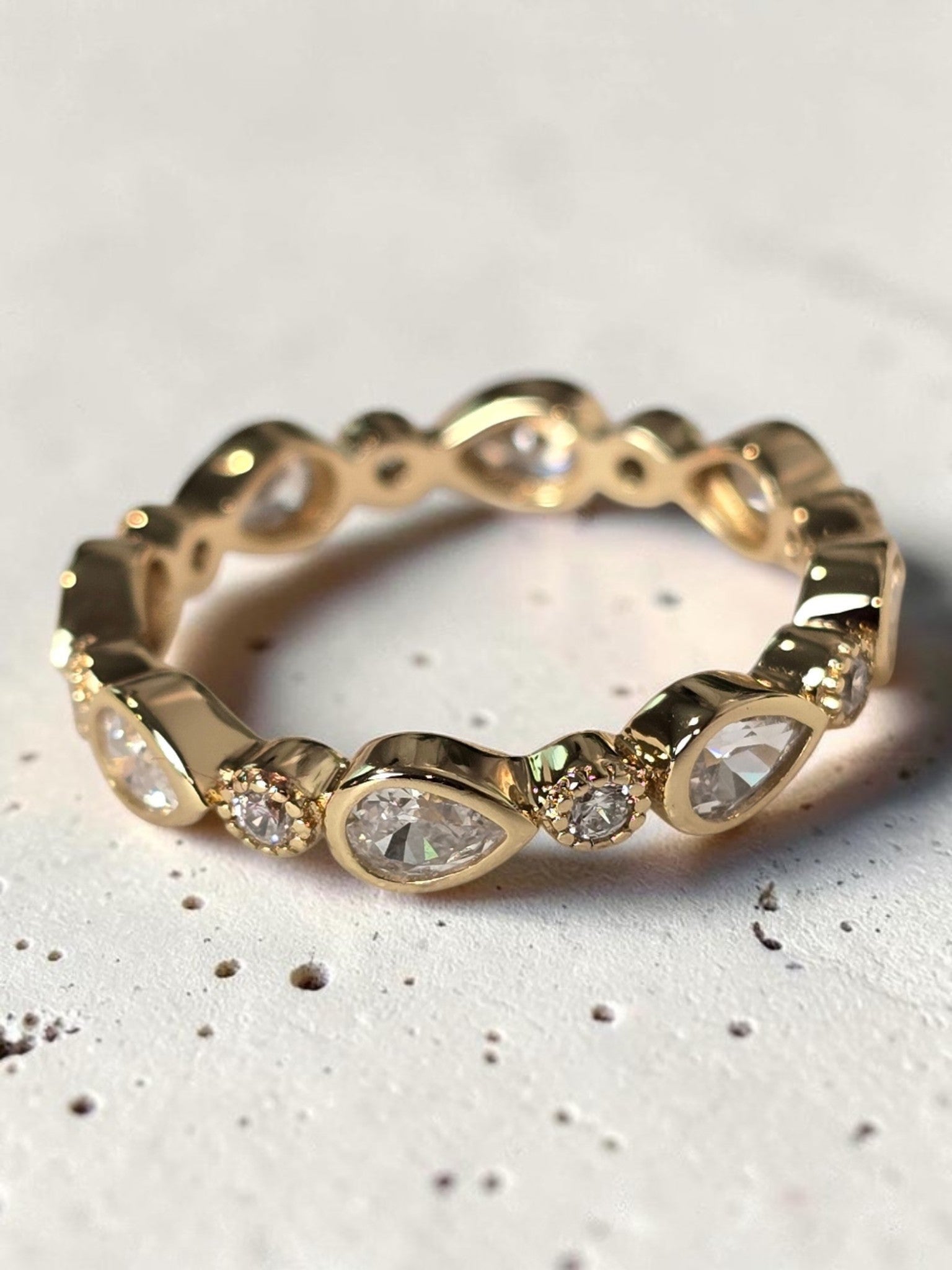 reveriebygemma gold plated sterling silver stacking ring with pear and round bezel-set cubic zirconia stones