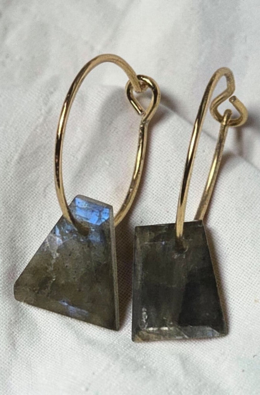 reveriebygemma 14kt gold plated huggie earrings with geometric labradorite stone drops showing iridescent blue flash
