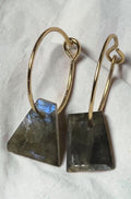 reveriebygemma 14kt gold plated huggie earrings with geometric labradorite stone drops showing iridescent blue flash