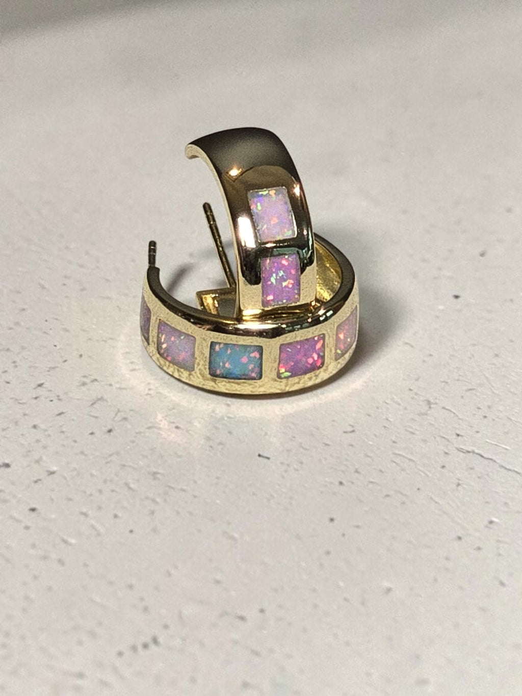 reveriebygemma 18kt gold vermeil hoop earrings featuring square-cut iridescent opal inlays in a colorful ombré pattern.
