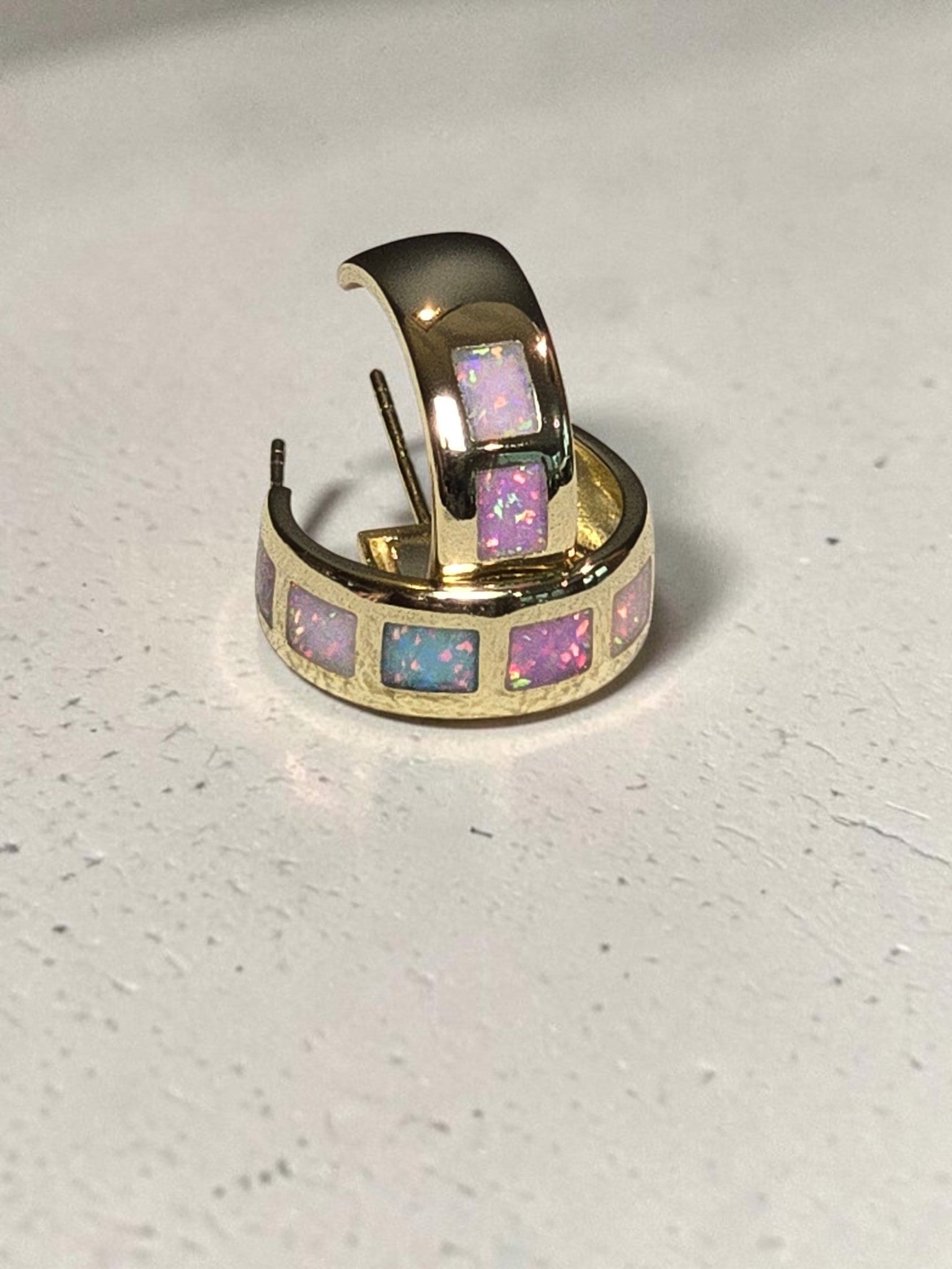 reveriebygemma 18kt gold vermeil hoop earrings featuring square-cut iridescent opal inlays in a colorful ombré pattern.