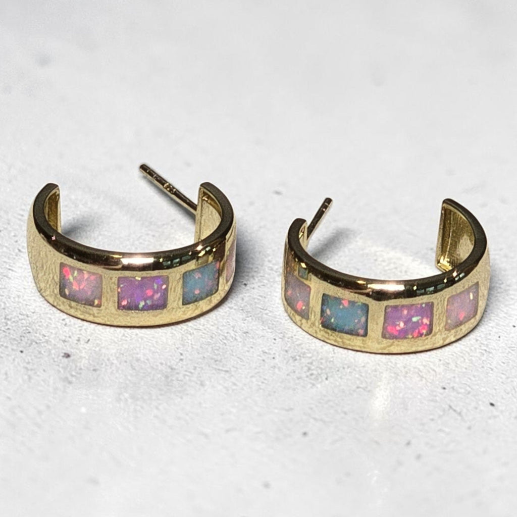 reveriebygemma 18kt gold vermeil hoop earrings featuring square-cut iridescent opal inlays in a colorful ombré pattern.
