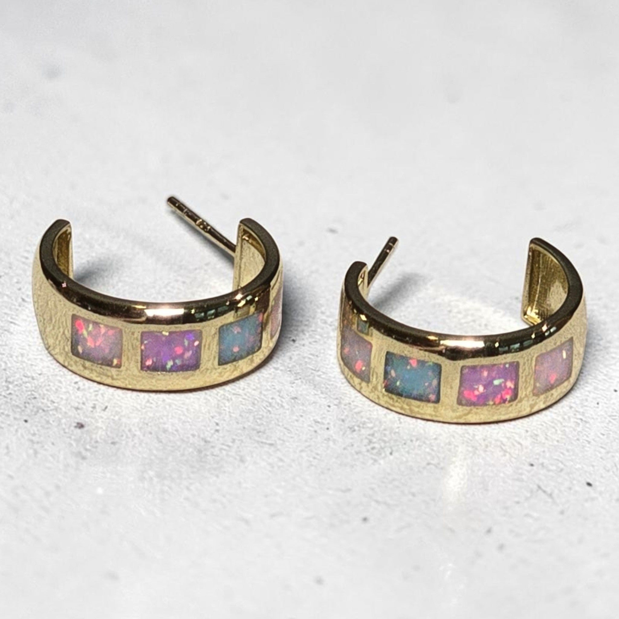 reveriebygemma 18kt gold vermeil hoop earrings featuring square-cut iridescent opal inlays in a colorful ombré pattern.