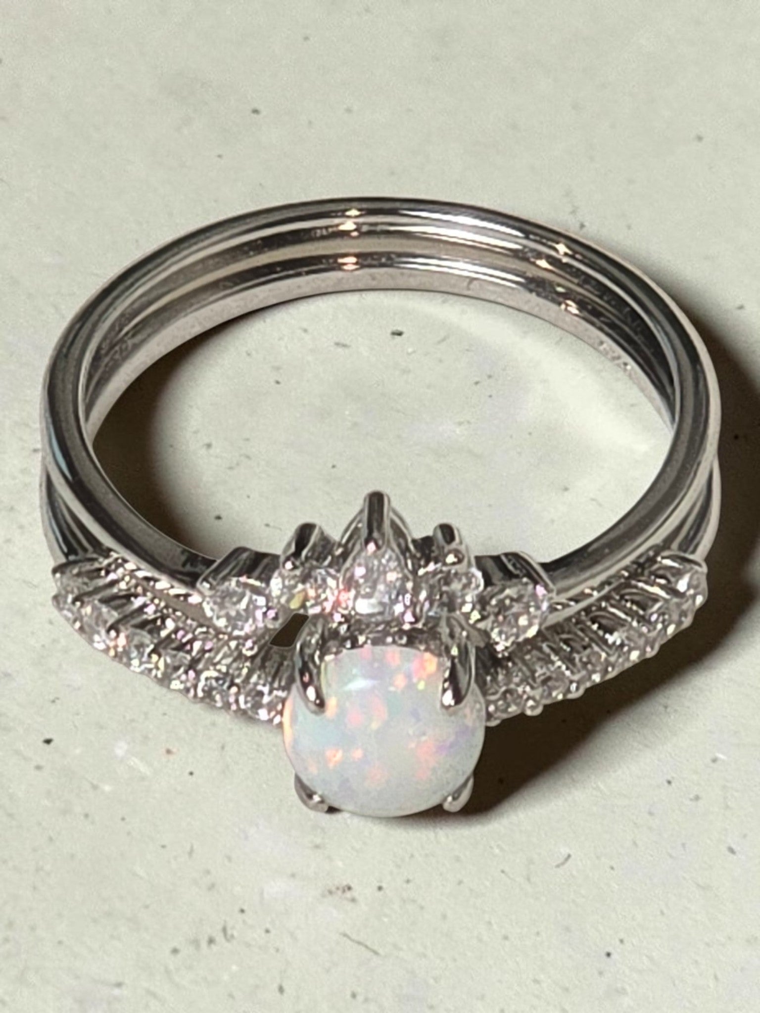 reveriebygemma opal tiara stacking ring set in rhodium plated sterling silver with pear and round cut cubic zirconia