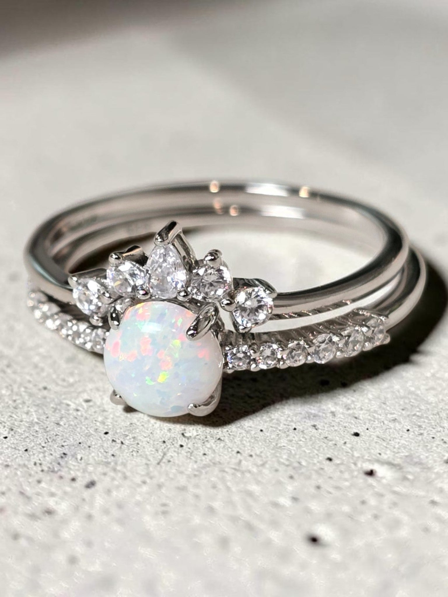 reveriebygemma opal tiara stacking ring set in rhodium plated sterling silver with pear and round cubic zirconia